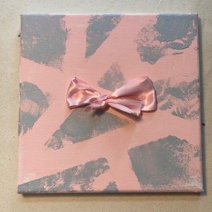 This is a cute abstract pink painting.